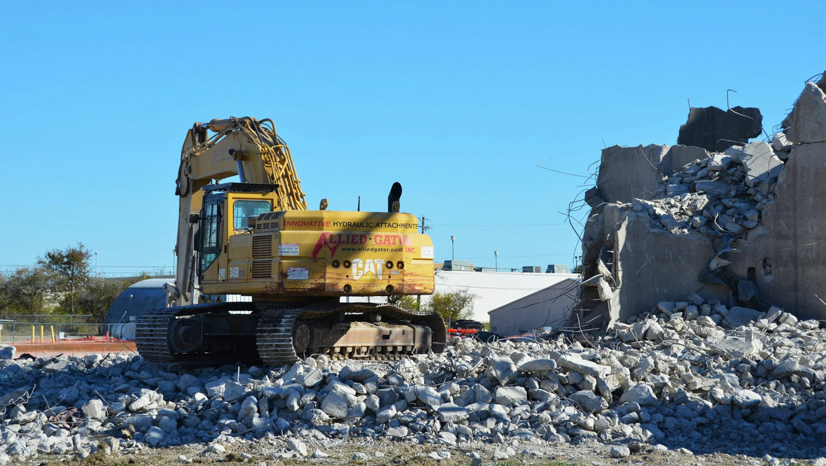 Concrete removal and hauling service with excavator in Royal Palm Beach FL